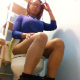 A black girl is recorded while sitting on a toilet taking a shit. About 3 minutes.